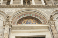 Tympanum on the central portal of the cathedral's façade - Pisa, Italy