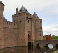 Façade of Muiden Castle entrance and the stone bridge and drawbridge - Muiden, Netherlands