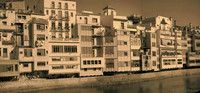 Façade of the buildings along the east shore of the Onyar - Girona, Spain