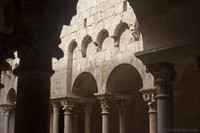 Arches on double columns in the monastery cloister - Girona, Spain