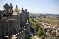 West part of the fortress of Carcassonne and the Pyrenees mountain range - Carcassonne, France